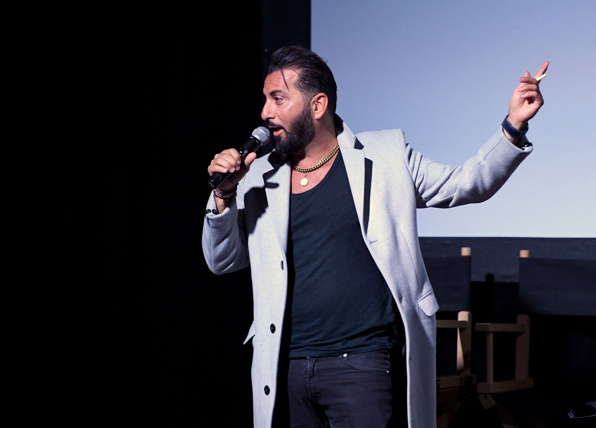 Actor, producer, and director Danny A. Abeckaser speaks during a Q&A after the screening of Saban Films' "Mob Town" (Image via Getty)